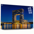 Acrylic print of Amsterdam scenery with vibrant hues of blue and orange, ideal for dining room decor.