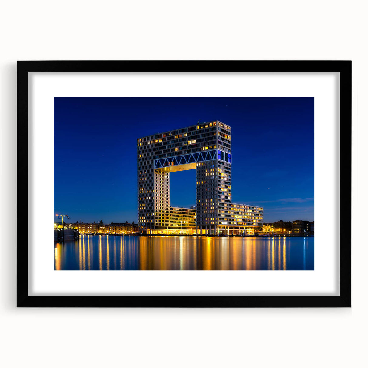 Extra large framed abstract art print of Amsterdam scenery in vibrant colors, textured finish.