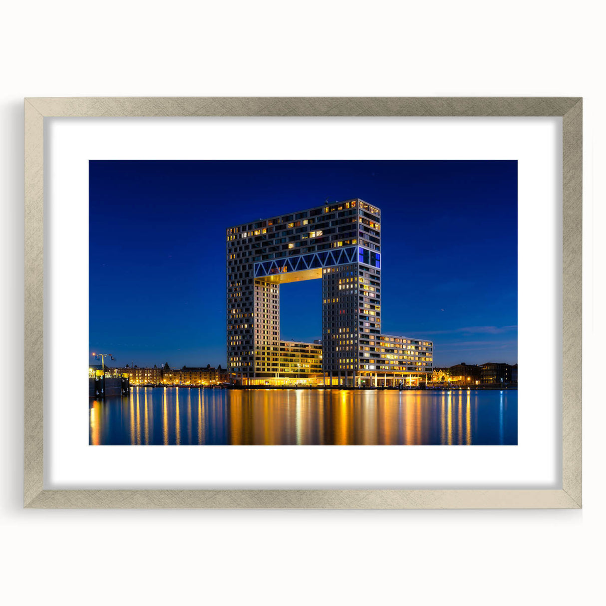 Extra large abstract art print of Amsterdam, featuring textured shades of blue and gray on a framed canvas.