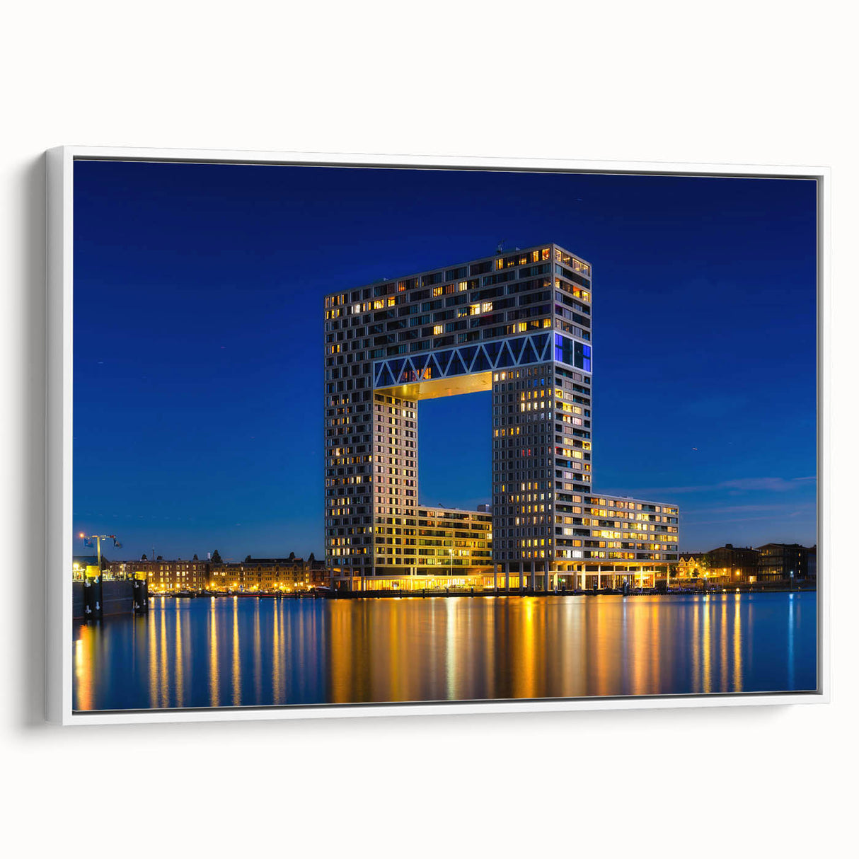 Vintage poster art of Amsterdam scenery in colorful hues on a large framed canvas, ideal for living room decor.