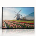 Large abstract wall art depicting a European scenery, using muted earth tones on a black framed acrylic.