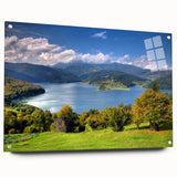 Acrylic print of a Romanian landscape, featuring rolling hills and a vibrant sunset, ideal for dining room decor.