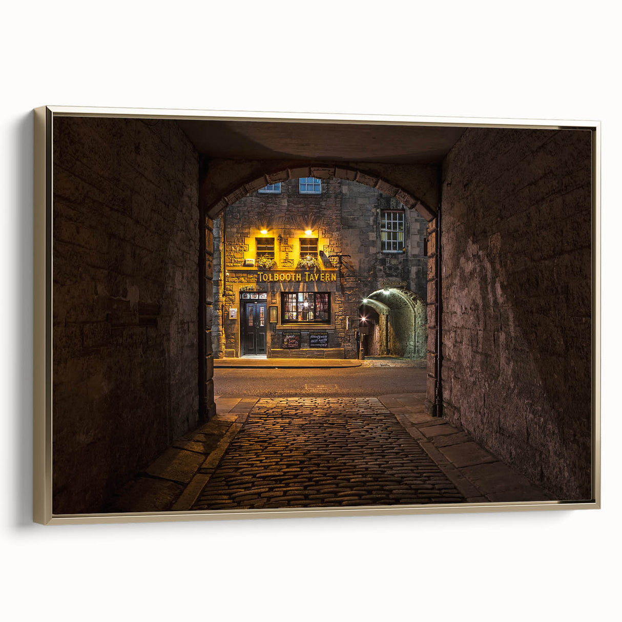 Framed canvas depicting a vintage-style Scottish landscape in black and gold tones, ideal for bedroom wall art.
