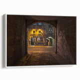 Framed vintage poster art of a Scottish landscape on canvas, featuring muted earth tones, ideal for living room decor.