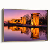 Framed canvas featuring a vintage-style landscape painting of Madrid with a black and gold color scheme.