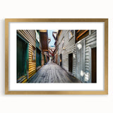 Extra large abstract art print of Stockholm scenery in textured gold frame, suitable for living room decor.