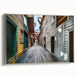 Framed canvas of a vintage Stockholm landscape in muted grays and vibrant colors, ideal for living room decor.