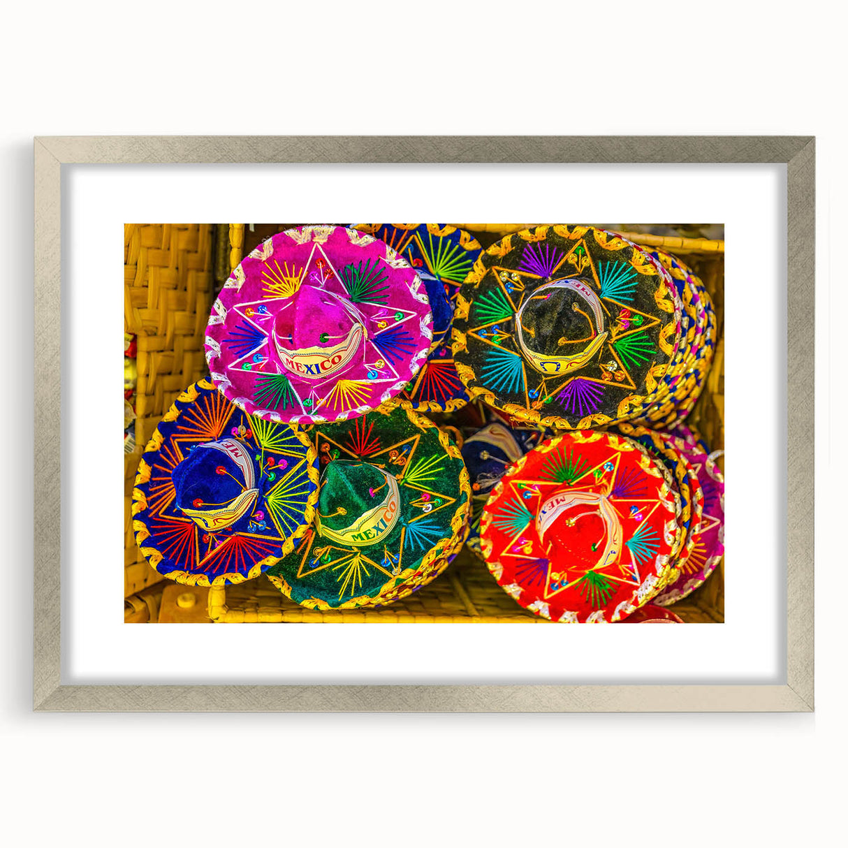Textured abstract art print of Cabo San Lucas scenery in silver frame, using vibrant ocean and sky hues.