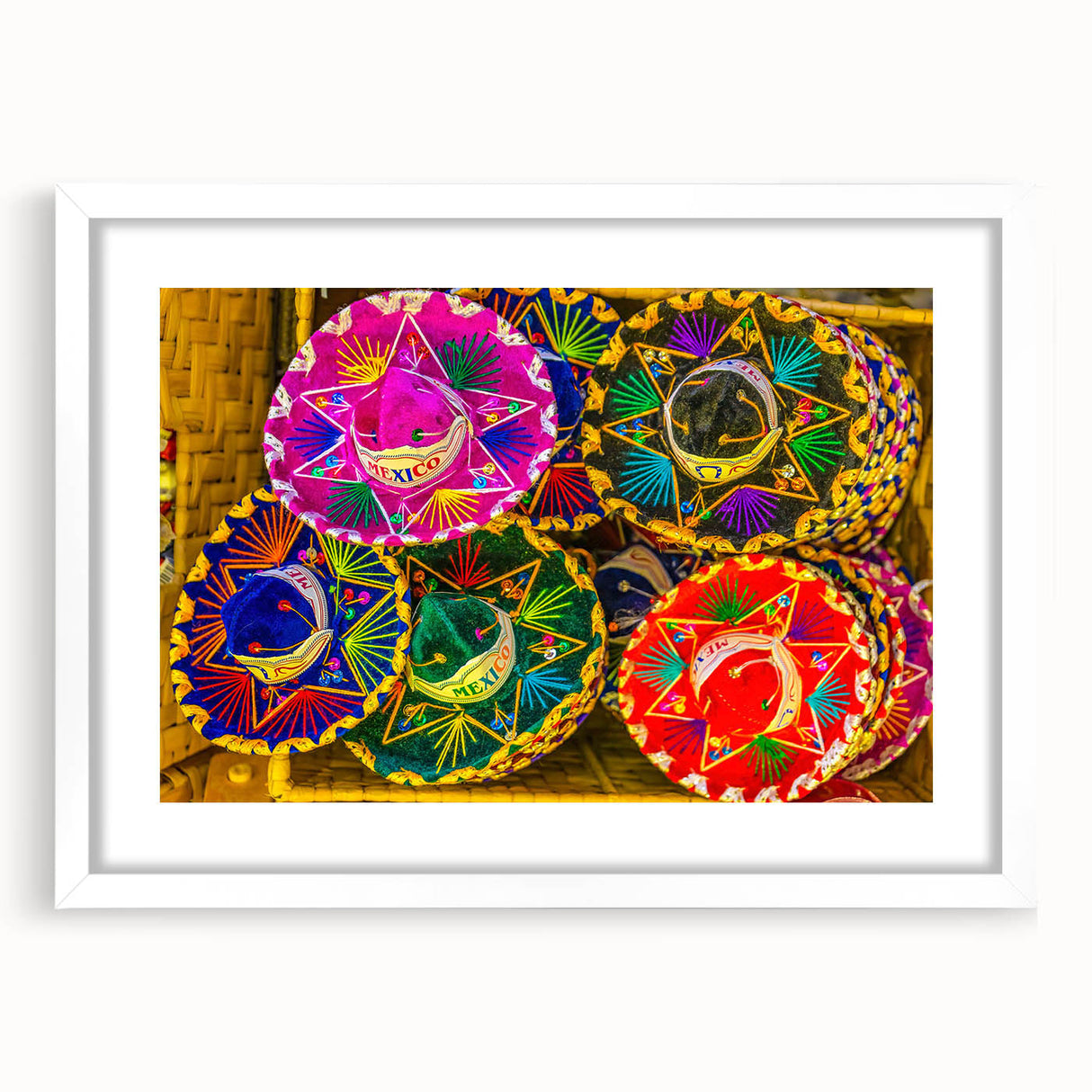 Abstract art print of Cabo San Lucas scenery in muted blue and green hues on a framed white mat, ideal for dining room decor.