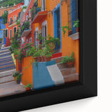 Framed canvas of a textured, colorful depiction of Guanajuato, Mexico, ideal for extra large living room wall art.