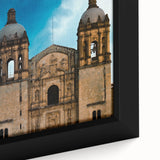 Extra large black wall art featuring a textured, colorful Oaxaca scenery on framed canvas, ideal for living room decor.