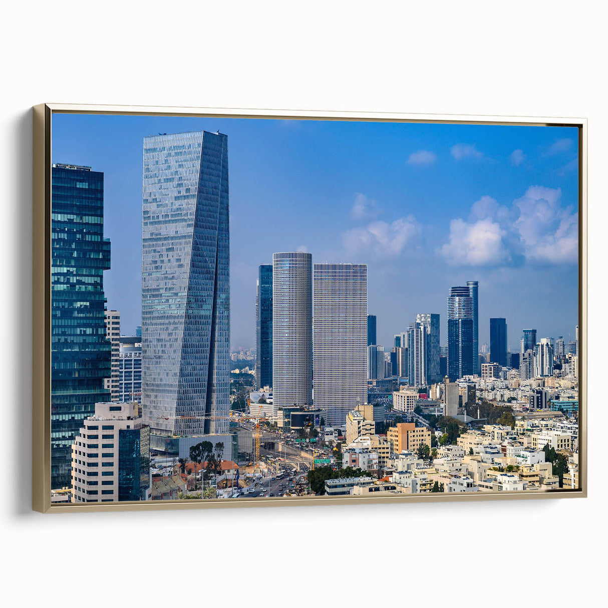 Framed canvas wall art of Tel Aviv landscape in muted gold and black tones, ideal for bedroom decor.