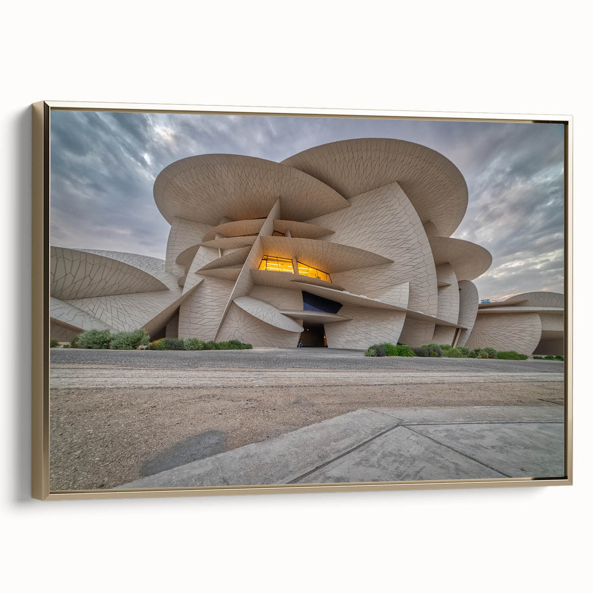 Framed canvas of a vintage-style Middle Eastern landscape in muted gold and black tones, ideal for bedroom wall decor.