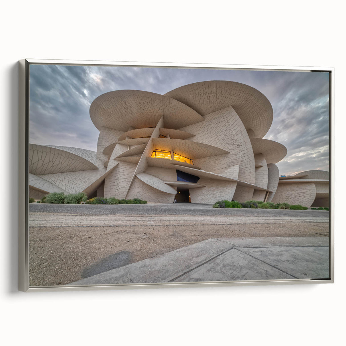Framed canvas featuring a vintage-style landscape painting of a Middle Eastern scenery in colorful tones.