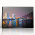 Large abstract wall art depicting a vibrant South American scenery in acrylic, framed in black.