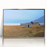 Mid-century modernist art depicting Alaskan scenery in muted earth tones on a silver-framed acrylic print.