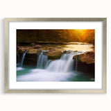 Textured abstract art print depicting a serene Arkansas landscape in muted earth tones, framed in silver.