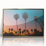 Large acrylic print of Los Angeles skyline in gold frame, featuring mid-century modernist style.