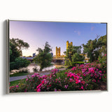 Framed canvas of Sacramento landscape with silver frame, featuring vintage-style colorful art on a black background.