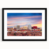 Extra large abstract art print of Colorado Springs in vibrant colors on a textured canvas, framed in black.