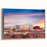 Framed canvas depicting a vintage-style landscape of Colorado Springs in muted gold and black tones.