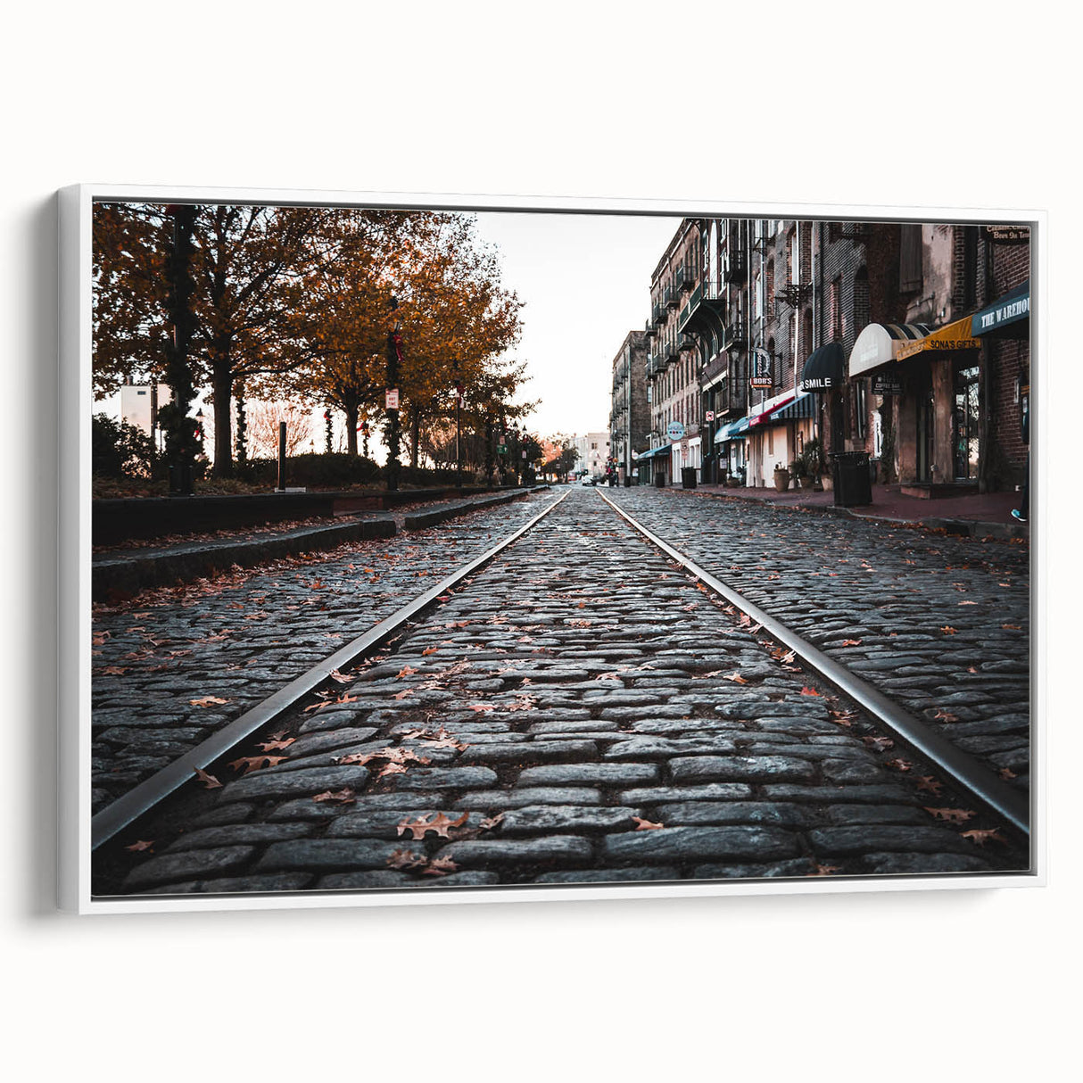 Vintage poster art of Savannah, Georgia in colorful hues on a white framed canvas, suitable for large living room walls.