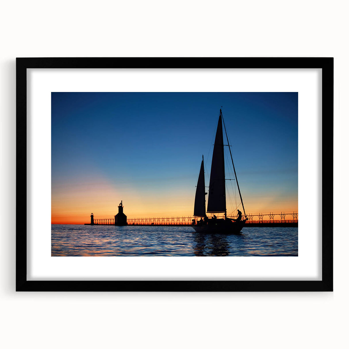 Extra large, abstract art print of Lake Michigan with vibrant colors and textured design on a framed black mat.