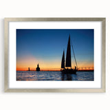 Textured abstract art print of Lake Michigan, in muted blue and gray tones on a framed canvas, suitable for bedroom decor.