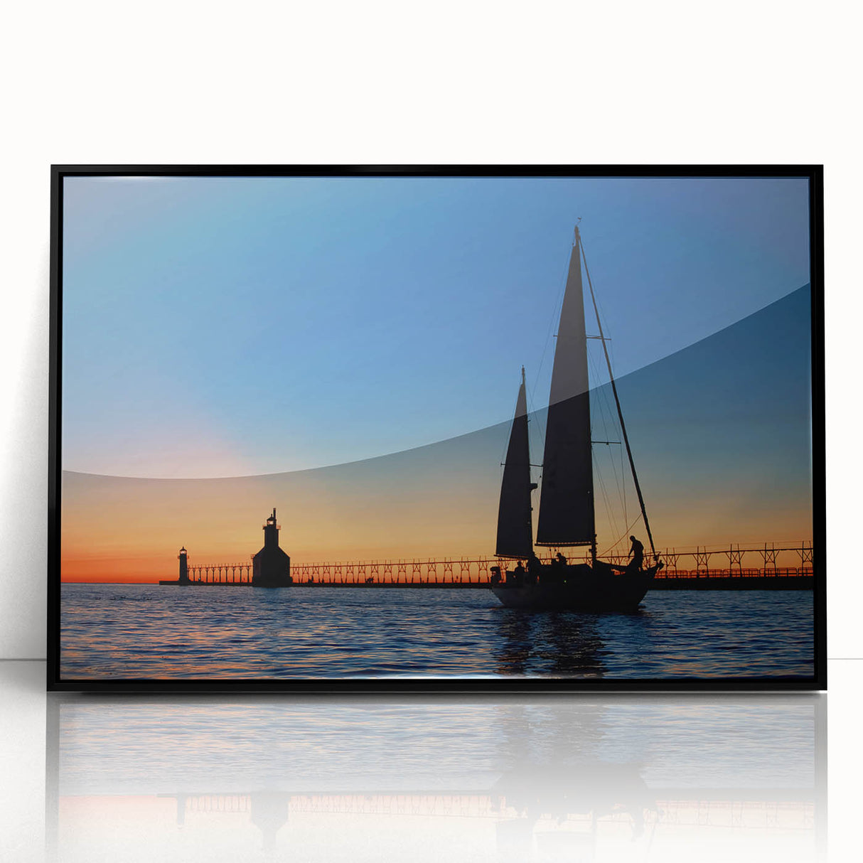 Large abstract wall art of Lake Michigan, with muted blue and gray tones, framed in black acrylic.