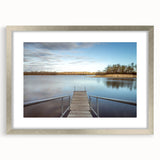 Textured abstract art print of Iowa scenery in muted earth tones, framed in silver, suitable for bedroom decor.