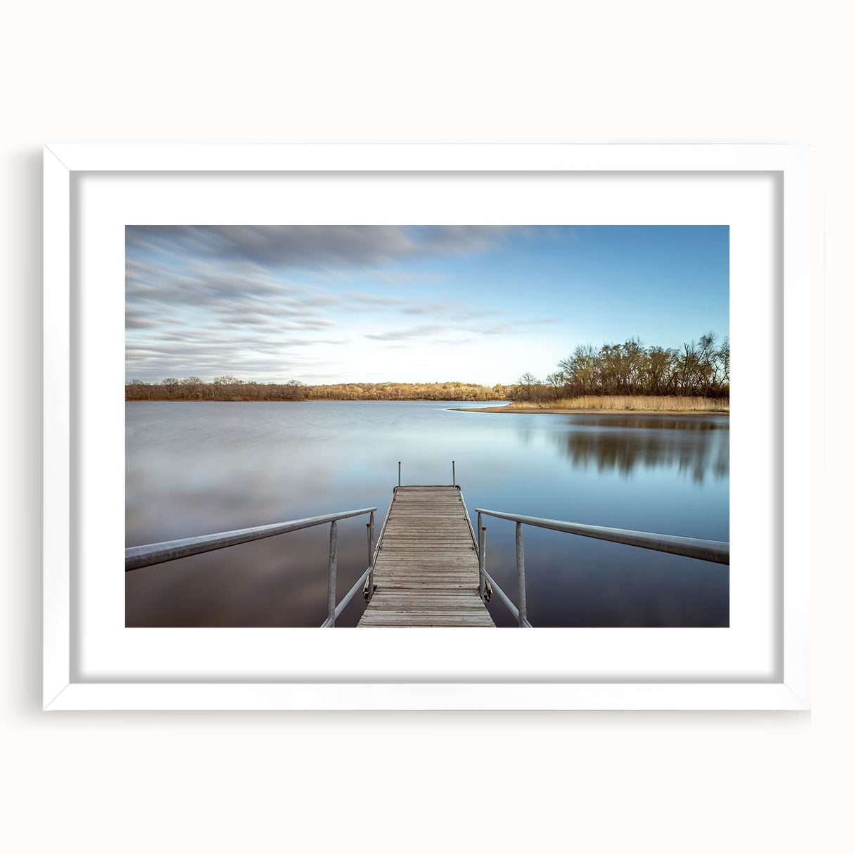 Abstract art print of Iowa scenery in muted green and blue, framed with a white mat, suitable for dining room decor.