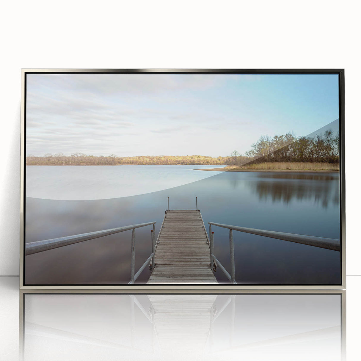 Mid-century modernist art depicting Iowa scenery in muted earth tones on a silver-framed acrylic print.