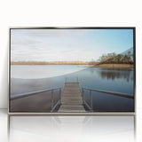 Mid-century modernist art depicting Iowa scenery in muted earth tones on a silver-framed acrylic print.