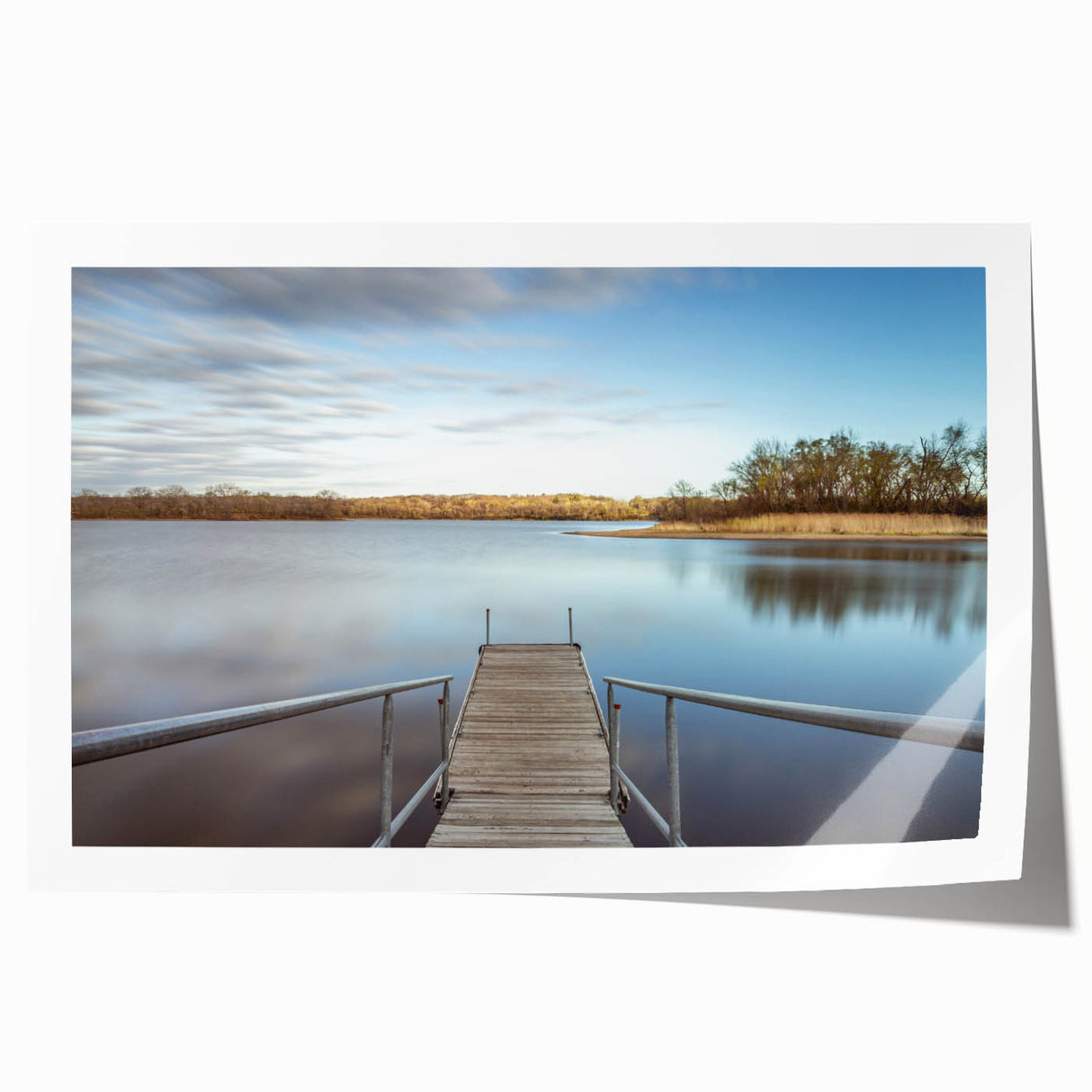 Rolled print of Iowa scenery with soft floral motifs in muted earth tones, suitable for dining room wall art.
