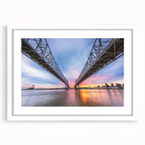 Abstract art print of New Orleans skyline in muted blues and grays on a framed white canvas, suitable for dining room decor.