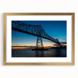 Extra large abstract art print of a textured Louisiana scenery in muted earth tones, framed in gold.