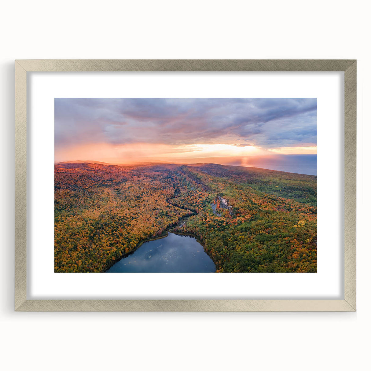 Textured art of Michigan's Upper Peninsula in abstract style, muted earth tones, framed with a silver mat.
