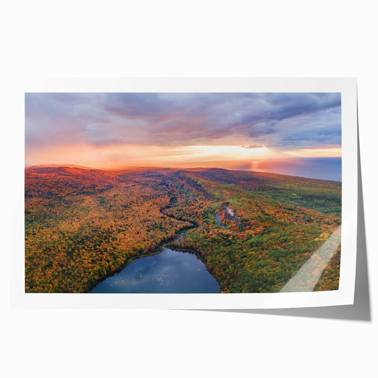 Scenic view of Michigan's Upper Peninsula on a rolled canvas print, featuring lush greenery and water.