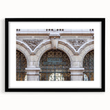Abstract art print of St. Louis skyline in colorful, textured style on a large framed canvas, suitable for living room decor.