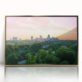 Mid-century modernist art of Raleigh, North Carolina skyline in gold and blue tones on framed acrylic.