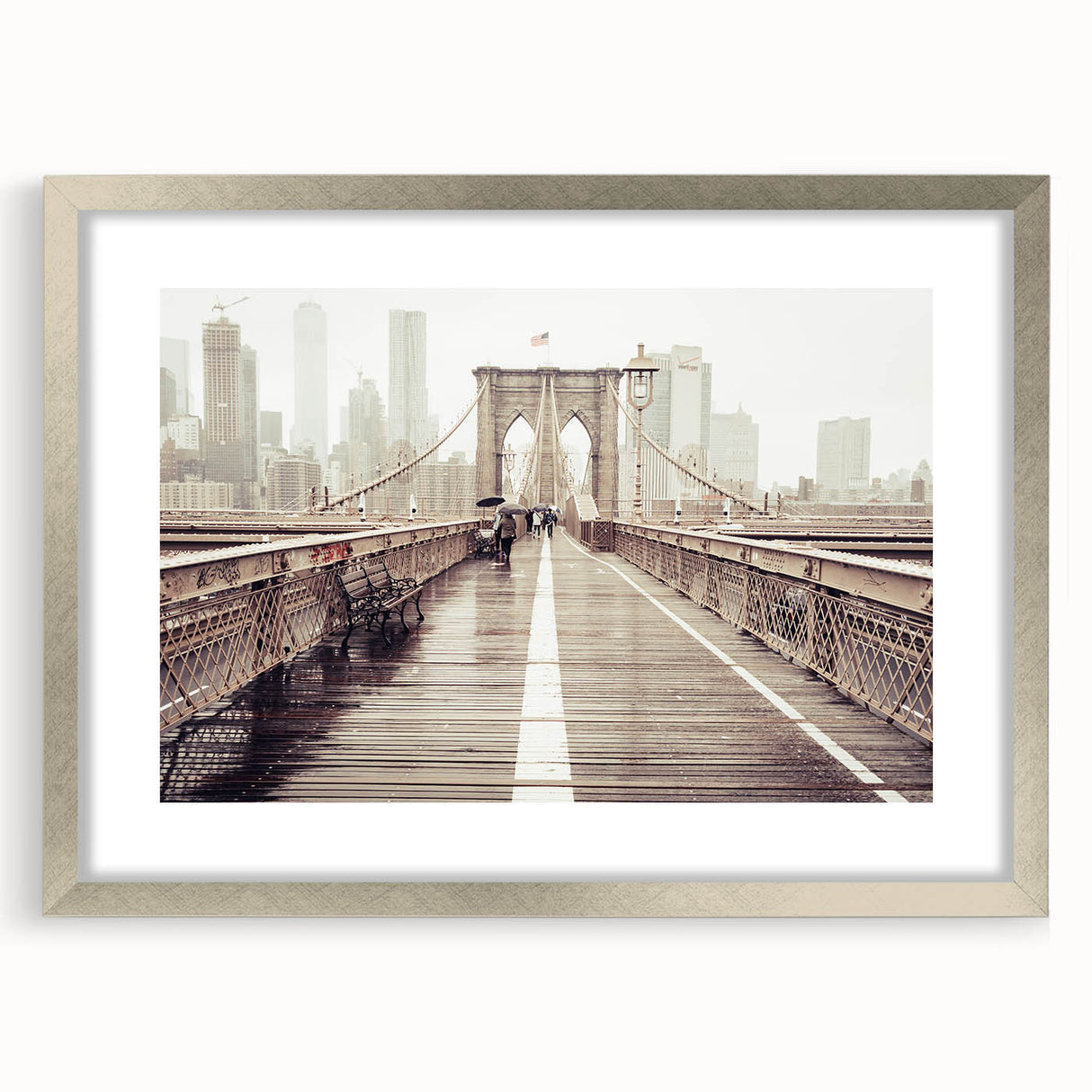 Textured art print of Brooklyn Bridge in grayscale, framed in silver, ideal for modern bedroom decor.