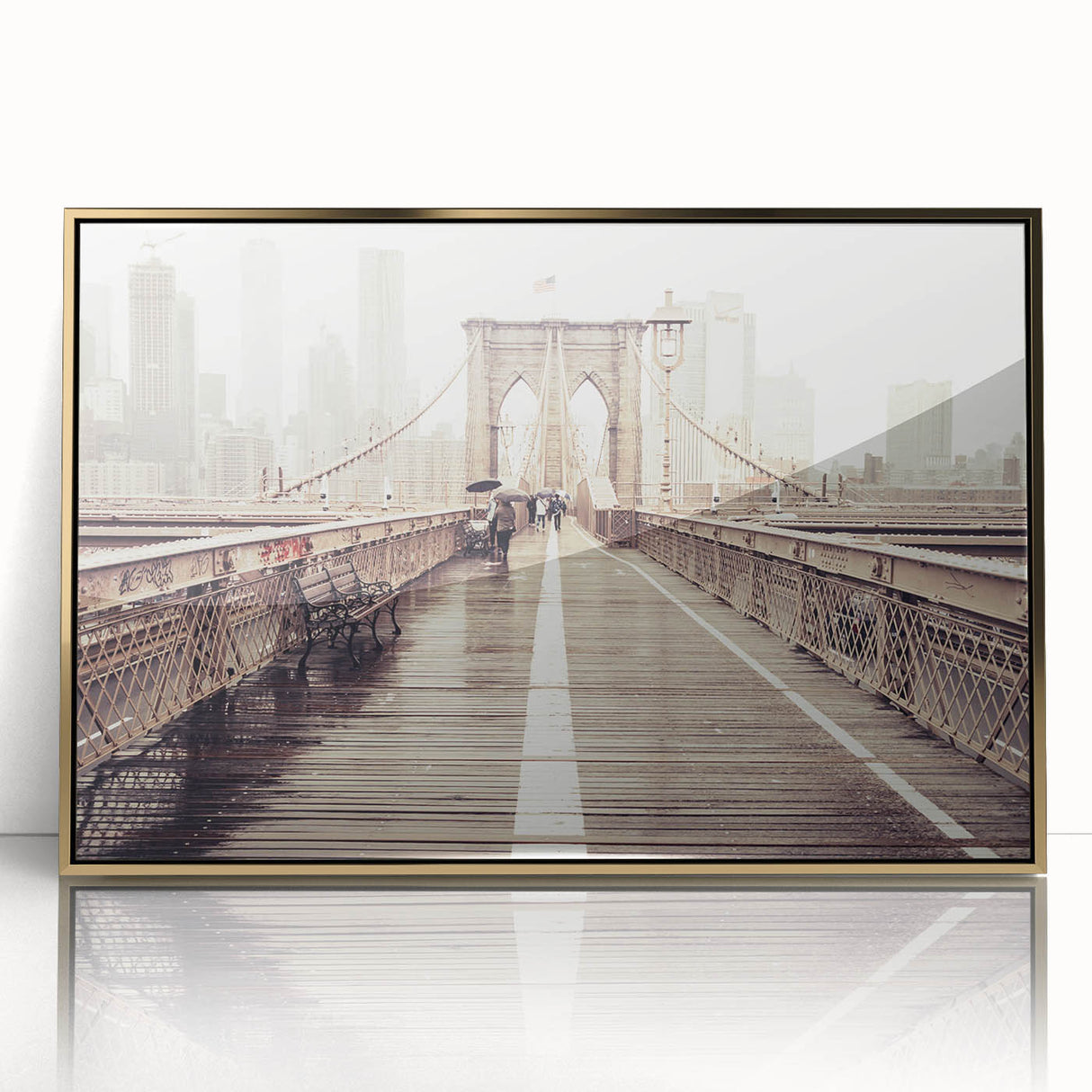 Large art print of the Brooklyn Bridge in muted gray tones, framed in gold acrylic, ideal for modern art wall decor.