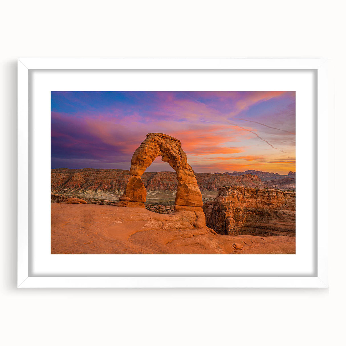 Abstract art print of Arches National Park in muted earth tones on a framed canvas, ideal for dining room decor.