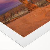 Art deco poster of Arches National Park in muted earth tones on rolled canvas, suitable for dining room decor.