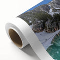 Art Deco style poster of the Grand Tetons in Wyoming featuring muted earth tones on rolled canvas.