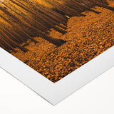 Art deco poster featuring an autumnal scene with warm orange and brown tones on a rolled canvas.