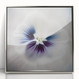 Framed acrylic wall art showcasing an abstract floral design in vibrant colors, with a sleek silver frame, perfect for modern home decor.