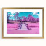 Elegant gold landscape bridge frame with a white mat, showcasing a serene nature scene. Ideal for home decor, adding sophistication to any space.
