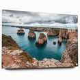 Acrylic artwork showcasing a stunning cliffside landscape with vibrant colors and intricate details, displayed in a glass frame and secured with decorative pins. Perfect for enhancing modern home decor or office interiors.
