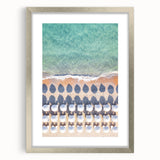 Textured abstract art print in orange and yellow hues, framed in silver, ideal for bedroom wall decor.